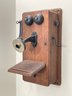 An Antique Oak Wall Phone