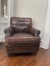 A Vintage Leather Arm Chair With Nailhead Trim