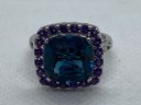 Very Fine Sterling Silver Ring With A Large Faceted London Blue Topaz Center Stone And Amethyst Surround