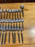Gorham Stainless Arts And Crafts Style Flatware Set.