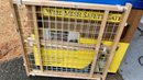 A Used Wire Mesh Safety Pet Gate