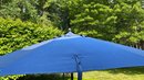 An Outdoor Classic Blue Umbrella With Sunbrella Fabric 104' Wide - No Stand