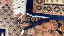 An Hand Knotted Wool Area Rug