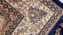An Hand Knotted Wool Area Rug