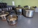 Collection Of 12 Cookware Pieces Including Pots And Pans