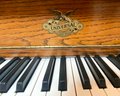 1980s Universal Player Piano With Over 100 Music Rolls