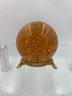 Amber Colored Crystal Ball On Stand