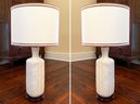 A Pair Of Ceramic Table Lamps With Wood Bases