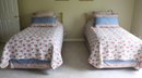 Pair Of Twin Beds With Bedding