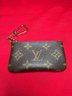 Authenticated Louis Vuitton Small Wallet With Attached Key Chain