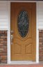 Therma-Tru Benchmark Doors  38-in X 82-in Fiberglass Oval Lite Right-Hand Inswing Medium Oak Stained