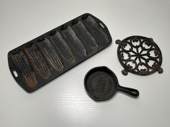 Cast Iron Collection, Corn Bread Mold, A John Wright Inc. #281 Trivet & St. Augustines Museum Mini Fry Pan