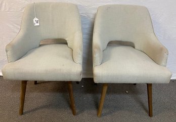 Pair Of Stylish Mid-century Swivel Arm Chairs