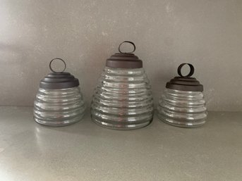 Three Beehive Canisters Each With Metal Lids