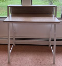 A Metal And Wood Student Desk
