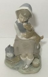 C. Lladro Girl Holding Puppy & Lantern Figurine. #4910