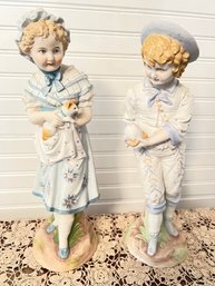 Pair Of Semi Vitreous  Ceramic Figurines