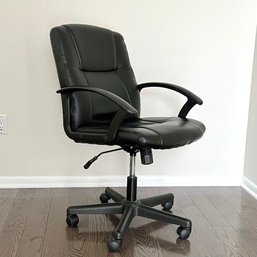 An Adjustable Black Swivel Desk Chair