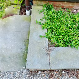 A Collection Of Bluestone Coping - Set In Mortar - Rear Parking Area