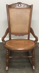 Antique Victorian Mahogany Rocking Caned Chair.