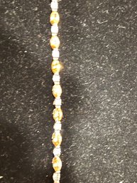 Citrine Color And Clear Tennis Bracelet, Set In Sterling Silver