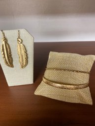 Gold Textured Bangles And Earrings