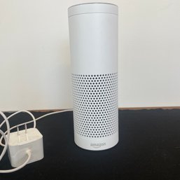 An AMAZON Alexa - CE0984 - 3' Diameter X 9'h