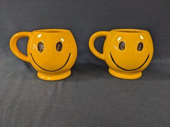 Two Vintage McCoy USA Smiley Face Mugs