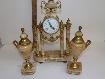 Three Piece French Pink Marble And Gilt Bronze Clock Set. White Porcelain Face And Original Clock Works