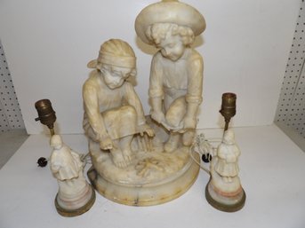 Victorian Marble Sculpture Of Two Children Around Campfire Along With Two Small Carved Marble Lamps