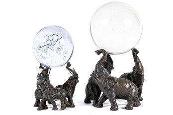 Two Brass Elephant Group Form Stands With Glass Spheres