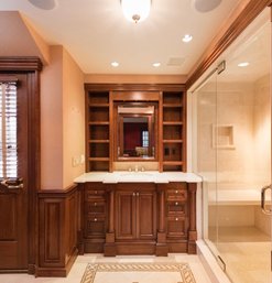 A Sophisticated Mahogany Custom Vanity & Medicine Cabinet With Stone Counter