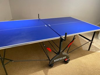 A Kettler Classic Folding Tennis/ping Pong Table