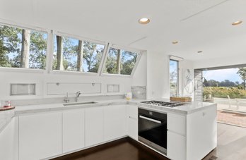 An Italian Design - Boffi  Cabinets - U Shaped Kitchen - Marble Counters - Includes Miele Stove Top & Hood