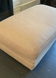 A Classic Linen Ottoman