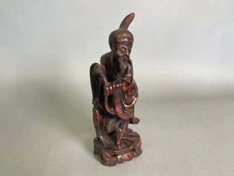 A Wood Carved Fisherman
