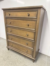 An Ethan Allen Cherry Wood Five Drawer Dresser