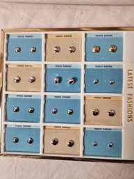 Display With 12 Pairs Of Silver Tone Pierced Earrings, All New