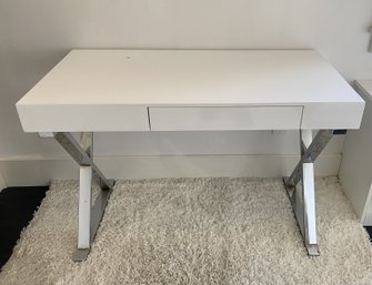 A White High Gloss Lacquer Desk With Single Drawer And Chrome Legs