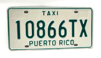 143. Antique Puerto Rico Taxi License Plate