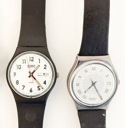 (2) Swatch Watches With Black Plastic Straps