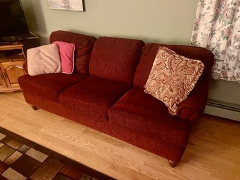 A Red Flex Steel Couch