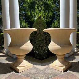 A Pair Of Cast Concrete Planters