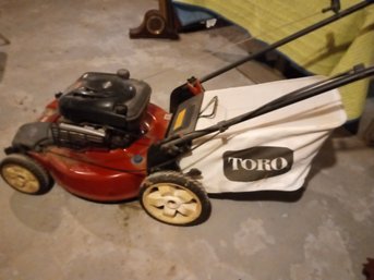 Toro 190 CC Gas Powered Lawn Mower Power Front Wheel Drive, Grass Catcher Bag, Safety Shut Off On Handle