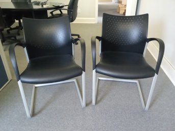 Beautiful Pair Of Office Side Chairs With Vinyl Seat Cushion Fabric And Plastic Backrests