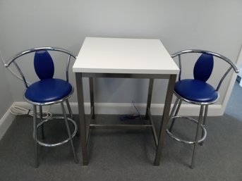 Charming Pair Of  Swiveling Aluminum Frame Stools With Beautiful Blue Vinyl Fabric An 40 Inch Tall Table