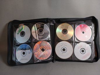 A Large Collection Of Dvds And Cds