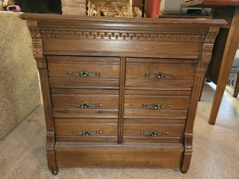 Beautiful Antique Six Draw Cabinet With Metal Casters And Walnut Finish