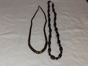 Two Black And Gold Necklaces