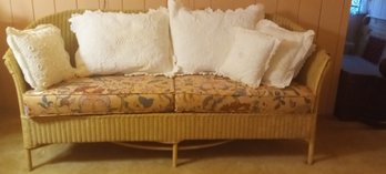 Beautiful Wicker Sofa With Lovely Floral Print Cushions